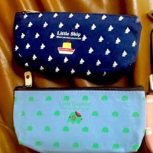 4 small cosmetic bags for travel or organizing in different colors.